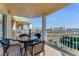 Spacious balcony with outdoor furniture and ocean view at 4650 Links Village Dr # D703, Ponce Inlet, FL 32127