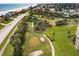 Community putting green near the ocean at 4650 Links Village Dr # D703, Ponce Inlet, FL 32127