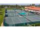 Community tennis courts near clubhouse at 4650 Links Village Dr # D703, Ponce Inlet, FL 32127