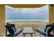 Enjoy breathtaking ocean views from this balcony, complete with seating at 4799 S Atlantic Ave # 3030, Ponce Inlet, FL 32127