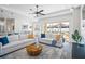 Comfortable living room with sliding glass doors to the pool at 508 Campana St, New Smyrna Beach, FL 32168