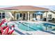 Beautiful freeform pool with a spa and expansive patio at 508 Campana St, New Smyrna Beach, FL 32168