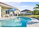 Resort-style pool and patio with seating and dining areas at 508 Campana St, New Smyrna Beach, FL 32168