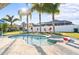 Relaxing freeform pool with spa and lush landscaping at 508 Campana St, New Smyrna Beach, FL 32168