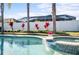 Relaxing pool and spa with a tranquil backyard setting at 508 Campana St, New Smyrna Beach, FL 32168