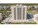 High-rise building near tennis court and pool at 5207 S Atlantic Ave # 1021, New Smyrna Beach, FL 32169