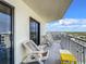 Relaxing balcony with chairs and ocean view at 5207 S Atlantic Ave # 1021, New Smyrna Beach, FL 32169