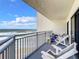 Spacious balcony with ocean view and seating at 5207 S Atlantic Ave # 1021, New Smyrna Beach, FL 32169