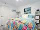 Bedroom with white bedding and ocean views at 5207 S Atlantic Ave # 1021, New Smyrna Beach, FL 32169