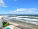 Panoramic ocean view with beach and pool at 5207 S Atlantic Ave # 1021, New Smyrna Beach, FL 32169