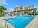 Refreshing community pool with hot tub at 5207 S Atlantic Ave # 1021, New Smyrna Beach, FL 32169