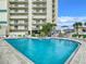 Relaxing community pool and hot tub at 5207 S Atlantic Ave # 1021, New Smyrna Beach, FL 32169