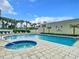 Inviting community pool and spa area at 5207 S Atlantic Ave # 1021, New Smyrna Beach, FL 32169