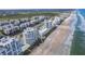 Aerial view of oceanfront community with multiple buildings at 5255 S Atlantic Ave # 1103, New Smyrna Beach, FL 32169