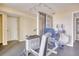 Private gym with weight machine and flooring at 5255 S Atlantic Ave # 1103, New Smyrna Beach, FL 32169