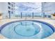 Relax in this community hot tub with ocean views at 5255 S Atlantic Ave # 1103, New Smyrna Beach, FL 32169