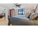 Main bedroom with king bed and access to the living room at 5255 S Atlantic Ave # 1103, New Smyrna Beach, FL 32169