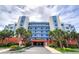 Condo building exterior showcasing modern design and oceanfront location at 5300 S Atlantic Ave # 17-206, New Smyrna Beach, FL 32169