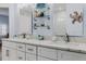 Bright bathroom features double vanity and marble countertops at 5300 S Atlantic Ave # 9-507, New Smyrna Beach, FL 32169