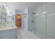 Spa-like bathroom with double vanity and large shower at 5300 S Atlantic Ave # 9-507, New Smyrna Beach, FL 32169