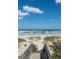 Wooden boardwalk leads to pristine beach at 5300 S Atlantic Ave # 9-507, New Smyrna Beach, FL 32169