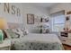 Cozy bedroom with a comfortable bed and built-in shelving at 5300 S Atlantic Ave # 9-507, New Smyrna Beach, FL 32169