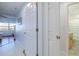 Clean hallway with access to bedrooms and bathroom at 5300 S Atlantic Ave # 9-507, New Smyrna Beach, FL 32169