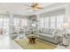 Spacious living room with comfy seating and coastal decor at 5300 S Atlantic Ave # 9-507, New Smyrna Beach, FL 32169