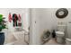 Bathroom with a toilet, vanity, mirror, and walk-in shower at 5340 Bear Corn Run, Port Orange, FL 32128