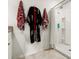 Bathroom with shower, unique wall art, and neutral color scheme at 5340 Bear Corn Run, Port Orange, FL 32128