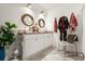 Bathroom with dual sinks, mirrors, countertop space, and natural light at 5340 Bear Corn Run, Port Orange, FL 32128