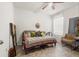 Inviting bedroom with a comfy bed, natural light, and minimalist decor at 5340 Bear Corn Run, Port Orange, FL 32128
