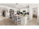 Bright kitchen features a large kitchen island and modern appliances at 5340 Bear Corn Run, Port Orange, FL 32128