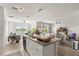 Open concept living room features tons of natural light and modern finishes at 5340 Bear Corn Run, Port Orange, FL 32128