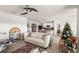 Comfortable living room featuring an open layout and access to kitchen at 5340 Bear Corn Run, Port Orange, FL 32128