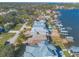 Aerial view of waterfront home with private dock and expansive backyard at 5727 Riverside Dr, Port Orange, FL 32127