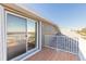 Deck with sliding glass doors leading to the interior at 5727 Riverside Dr, Port Orange, FL 32127