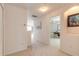 Bright hallway connecting bedrooms and other areas at 5727 Riverside Dr, Port Orange, FL 32127