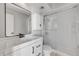 This modern bathroom features a sleek vanity, stylish fixtures, and a glass-enclosed shower at 632 Sausalito Blvd, Casselberry, FL 32707