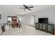 Open living space with tile flooring, ceiling fan and ample room for dining table at 632 Sausalito Blvd, Casselberry, FL 32707