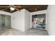 Sun room with tile floors, sliding glass door, and wood plank ceiling at 632 Sausalito Blvd, Casselberry, FL 32707