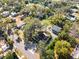 Aerial view showcasing a house with two separate apartments and ample green space at 636 Faulkner St, New Smyrna Beach, FL 32168