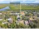 Aerial view of property near the water, featuring two separate apartments at 636 Faulkner St, New Smyrna Beach, FL 32168