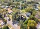 Aerial view showcasing a house with two separate apartments and ample green space at 636 Faulkner St, New Smyrna Beach, FL 32168