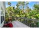 Wooden deck overlooking a lush, green backyard at 636 Faulkner St, New Smyrna Beach, FL 32168