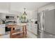 Modern kitchen with stainless steel appliances and island at 636 Faulkner St, New Smyrna Beach, FL 32168