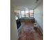 Bathroom with large window, terracotta tile floor, and under-construction features at 654 Marina Point Dr # 654, Daytona Beach, FL 32114