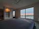 Main bedroom with sunset water views at 654 Marina Point Dr # 654, Daytona Beach, FL 32114