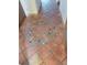 Terra-cotta tile floor with turtle mosaic at 654 Marina Point Dr # 654, Daytona Beach, FL 32114