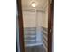 Large walk-in closet with shelves and hanging rods at 654 Marina Point Dr # 654, Daytona Beach, FL 32114